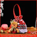 Weihnachts-Geschenkbeutel aus Jute mit Plüsch-Rentier und kariertem Design - Rindenoptik Griff Rentier / Rot