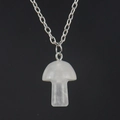 Detailed view of 2cm mini mushroom crystal pendant on a delicate silver chain - White Crystal