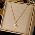 Detailed view of a gold seahorse pendant necklace with sparkling micro-pave zirconia stones - Seahorse (XL1494-18)