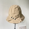 Lightweight khaki nylon bucket hat with decorative overlapping straps and black snaps - Khaki