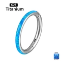 G23 Titanium septum ring featuring blue pacific opal inlay in a circular punk style - OP05 Side View (Blue)