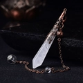 Macro detail of clear quartz crystal pendant with antique copper floral metal cap - Antique Bronze Clear Quartz