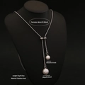 Long stainless steel snake chain necklace with dual faux pearl pendants on black bust - Double Pearl Pendant Style (3#)