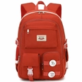 Red durable nylon school backpack featuring multiple zipper pockets and decorative badges - Bare Bag / Red