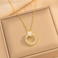 Detail of gold necklace with white heart opal and zircon pendant in luxury box - 437 Gold Plated Necklace