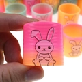 Mini plastic spring toy with pink-orange gradient and cute cartoon rabbit pattern - Rabbit Pattern