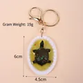 Realistic turtle soup keychain made of resin with golden ring 6cm x 4.5cm 19g - Oval Platter - Turtle / Gold 8-shaped Clasp