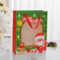 Christmas gift bag with transparent window, Santa pattern and red ribbon handle - Santa Claus