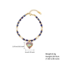 Bracciale occhio greco con perline blu e ciondolo a cuore in finitura oro - Blu/Lapis/Occhio a Cuore