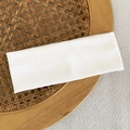 Minimalist white ribbed knitted sports headband displayed on a natural woven tray - White