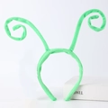 Detail of green fuzzy butterfly antenna headband with a curly plush wire texture - Green Ant Antenna