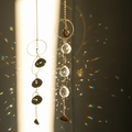 Golden crystal suncatcher wind chime featuring transparent faceted beads and hanging pendant - Design No.9