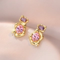 Vintage gold earrings with oval pink and purple zircons on beige satin background - Hammered Tri-Color Gemstone (E0141) / Gold/Purple/Pink