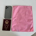 Pink nylon zipper pouch shown next to a smartphone for size reference in a flat lay view - 30*23 / Pink