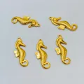 Set of five golden seahorse pendants in metal for ocean style necklace jewelry - Gold Oil-pressed Seahorse