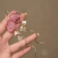 Close-up of handmade pink fabric flower earrings with white lily of the valley tassels - Gold Pink Fabric Flower Ear Hook (22#)