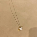 Silver chain necklace with heart, star and green gemstone pendants on beige background - Star Green Gem Multi-Element Style