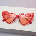 Translucent red heart-shaped sunglasses with stylish UV400 lenses for party wear - Transparent Red