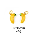 Macro shot of 10x15mm yellow banana charms with green enamel detail and gold loops - Curved Banana (10*15mm)