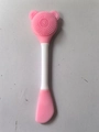 Pink and white dual-ended silicone facial cleanser brush and face mask applicator tool - Light Pink Spatula Head