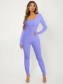 Detail of purple long sleeve jumpsuit showing ribbed knit texture and square neck design - S / Purple