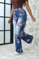 High-waisted dark blue denim jeans featuring floral patterns with a wide-leg fit - S / Blue