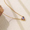 Detail shot of heart-shaped gradient purple crystal pendant with gold chain on stone - Colorful Heart Style (BD021-seven-colors)