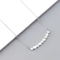 Detailed macro view of geometric hexagonal pendant with micro-pave white zircon stones - Necklace / White Gold