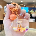 Porte-clés ours orange créatif en forme de biberon avec paillettes et liquide flottant - Ours à Salopette Biberon / Orange