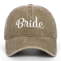 Close-up of white Bride embroidery on vintage washed khaki cotton baseball cap texture - BRIDE / Khaki