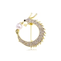 Golden dragon brooch with white rhinestones and a large pearl in circular design - Gold White Rhinestone Pearl Round Dragon