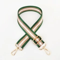 Detail of adjustable green and white striped nylon bag strap with gold metal hardware - Green