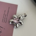 Elegant silver flower hair clip featuring a sparkling pink crystal center and polished finish - Silver/Pink Zirconia-Oval Gem Flower