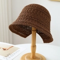 Dark brown crochet straw bucket hat with breathable hollow knit on a wooden stand - M (56-58cm) / Lotus Wave Edge Style (5642) / Brown