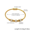 Macro view of gold PVD stainless steel snake chain bracelet with 5A cubic zirconia charms - Gold Snake Bone Bracelet (Z004)