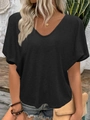 Detail of a casual black V-neck short sleeve T-shirt with soft wrinkled fabric texture - S / Tops / Black