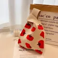 Knitted tote bag with red persimmon patterns and beige knotted handle strap - Apricot Persimmon
