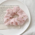 Pink organza scrunchie with golden star patterns on vintage paper and white plate - Star Pink