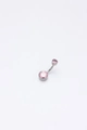 Macro shot of silver titanium belly ring featuring two pink cubic zirconia stones - 1.6*10*5*8 / Titanium Silver + Pink Zircon