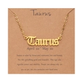 Detail of gold Taurus zodiac necklace with gothic font pendant on character card - Gold-Taurus