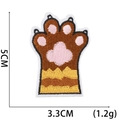 Detail view of cat paw embroidery patch with dimensions 5x3.3cm and 1.2g weight - No.27 (Tabby Paw)