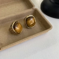 Set of two gold metal rings featuring square brown tiger eye stones and textured carvings - US 7 / Tiger Eye Style