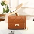 Caramel quilted shoulder bag with triangle pattern, gold chain strap and square lock closure - Brown