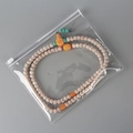 Double-layer beaded necklace with Bodhi seeds and turquoise accents in a poly bag - 30 Silk 18*15cm (100 Pcs)