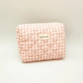 Detail of pink and white quilted plaid cosmetic bag with stitched Jolly House woven label - Pink & White Plaid