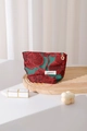 Detailaufnahme von Jacquard-Stoff und goldenem Blumen-Reißverschluss an Kosmetiktasche - Klein / Rot