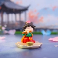 Tang Dynasty lady tumbler figurine in red and green robes playing a flute ornament - Tang Dynasty Lady Series / Flute