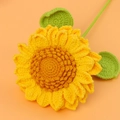 Handmade crochet sunflower with yellow petals and green leaves on orange background - (type E) Large Double-layer Sunflower Seeds - Yellow
