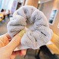 Plush faux fur scrunchie in elegant grey finish for autumn and winter hairstyles - Gray