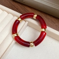 Minimalist acrylic beaded bracelet with dark red segments and gold metal spacers - Dark Red